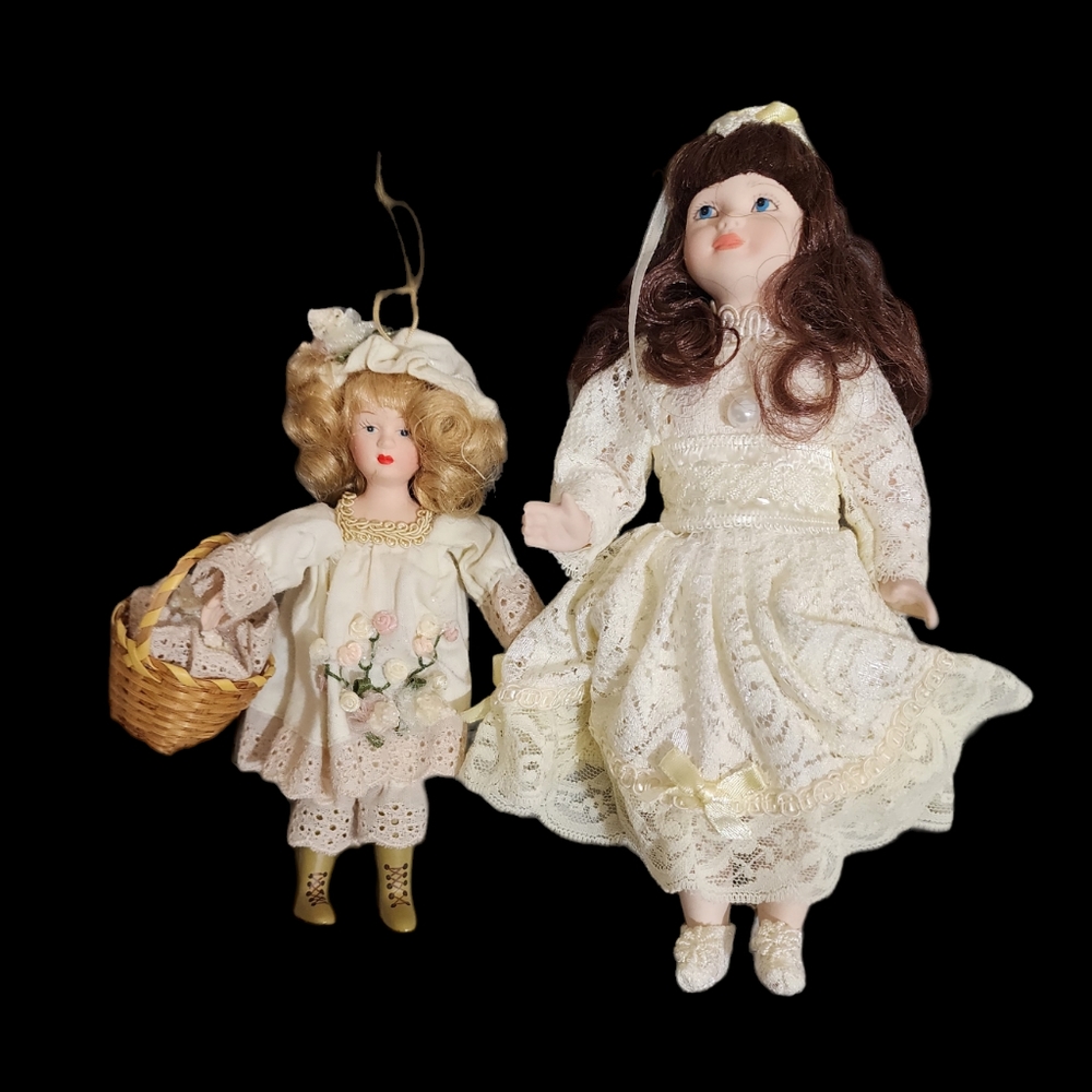 Two vintage porcelain dolls